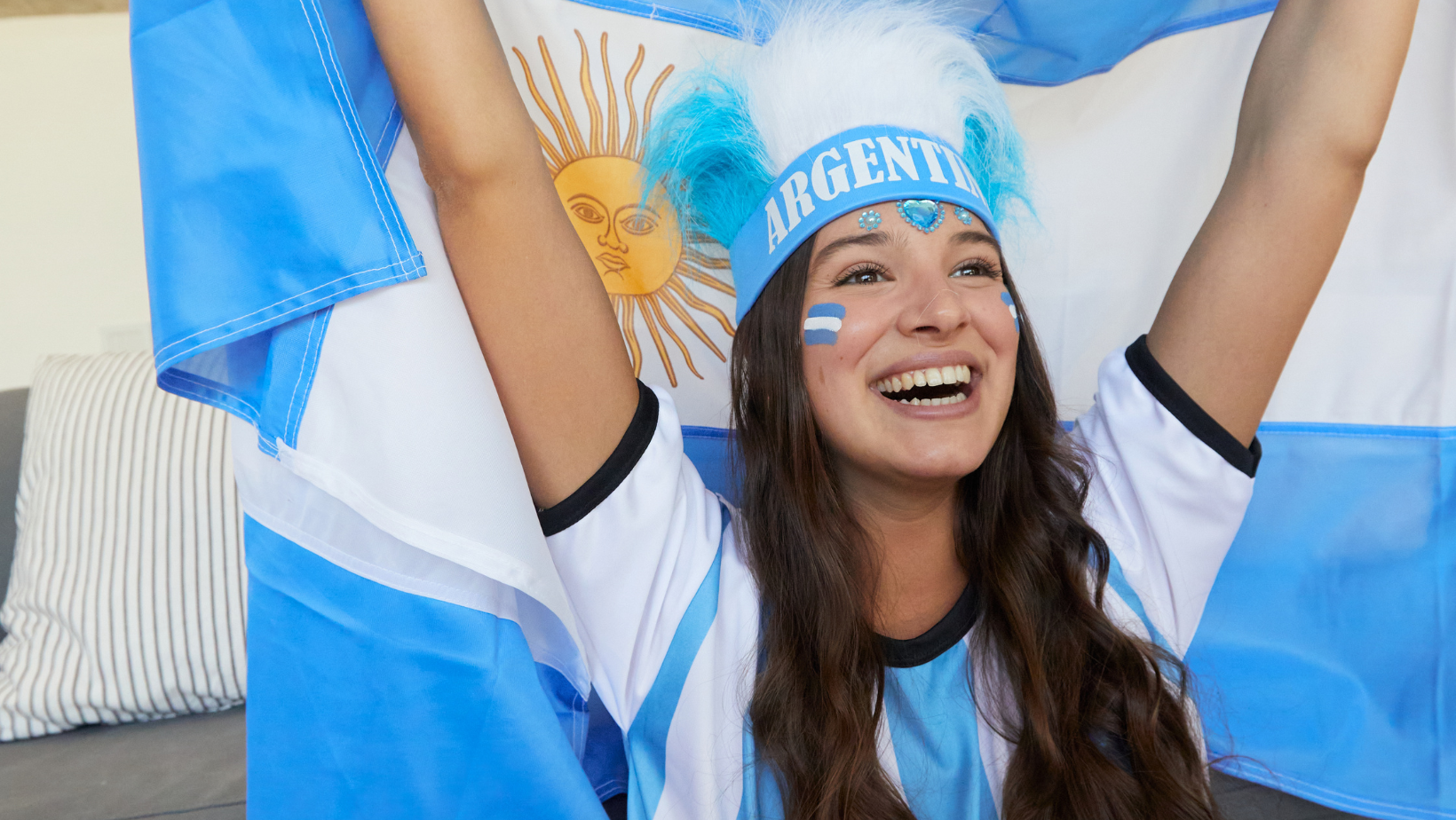 Argentinian Woman calebrating the victory in the FIFA World Cup 2022 in Qatar